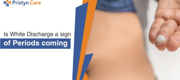 Is white discharge a sign of period coming?
