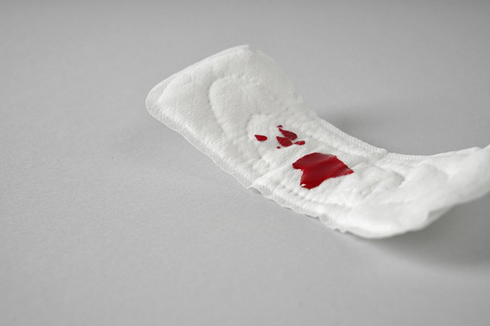 What does Spotting instead of the Period indicate?