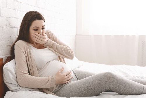 pregnant woman feeling nauseous 
