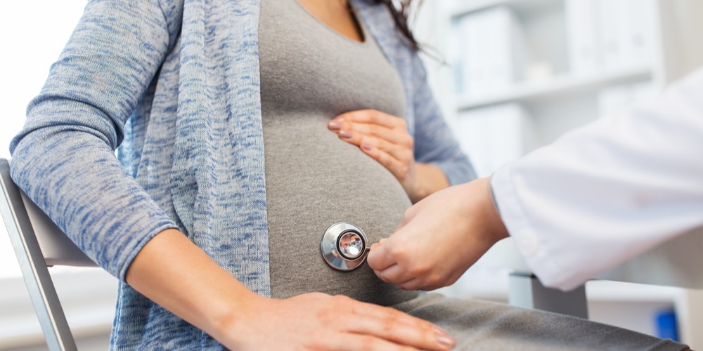 pregnant female at doctor 