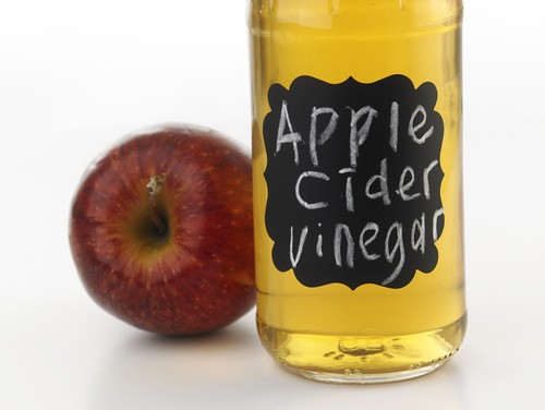 apple cider vinegar in a glass bottle 