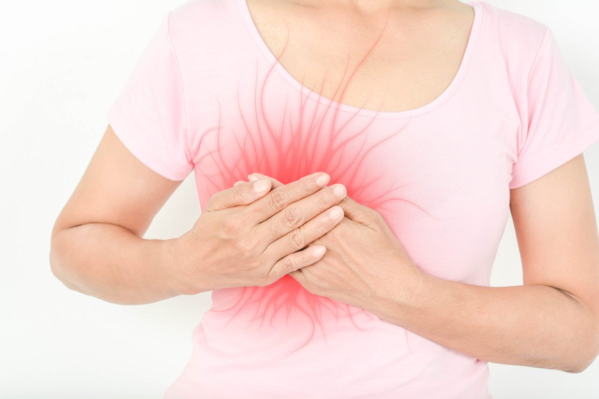 woman having pain in breasts