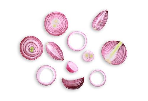sliced onions on a white background