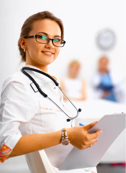 Female Doctor Holding A Prescription Board