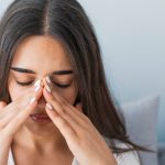 woman having pain due to sinus