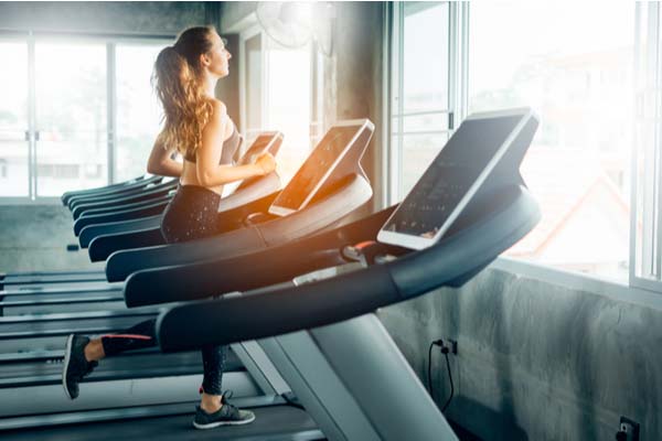 Girl running on the treadmill