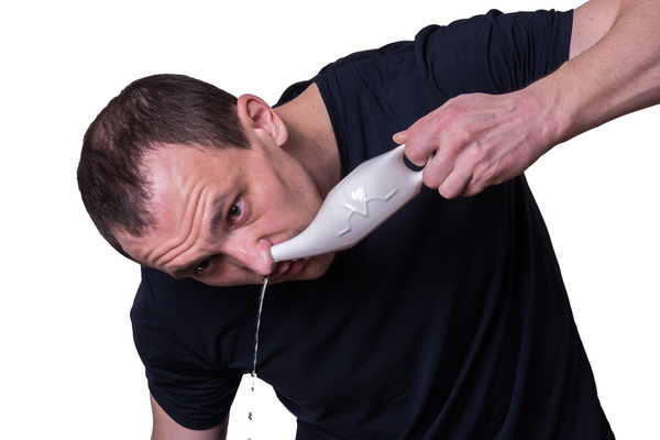 Man using a neti pot