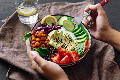 woman eating salad 