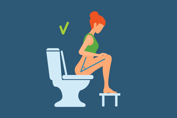 woman on toilet with squatting stool 
