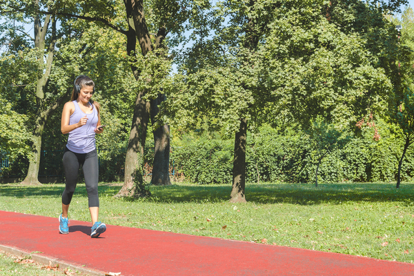 woman walking in a park