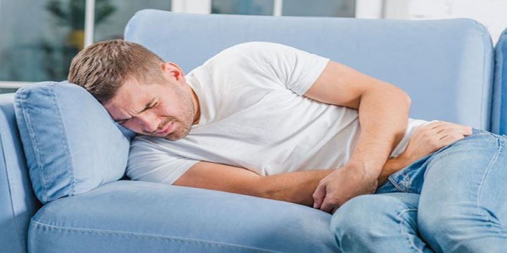 young man suffering from urinary infection