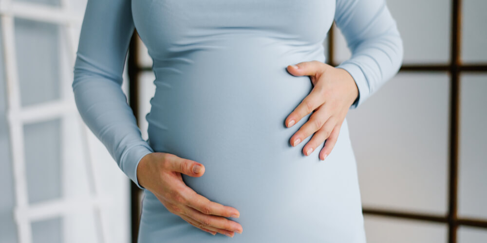 pregnant woman in a tight dress