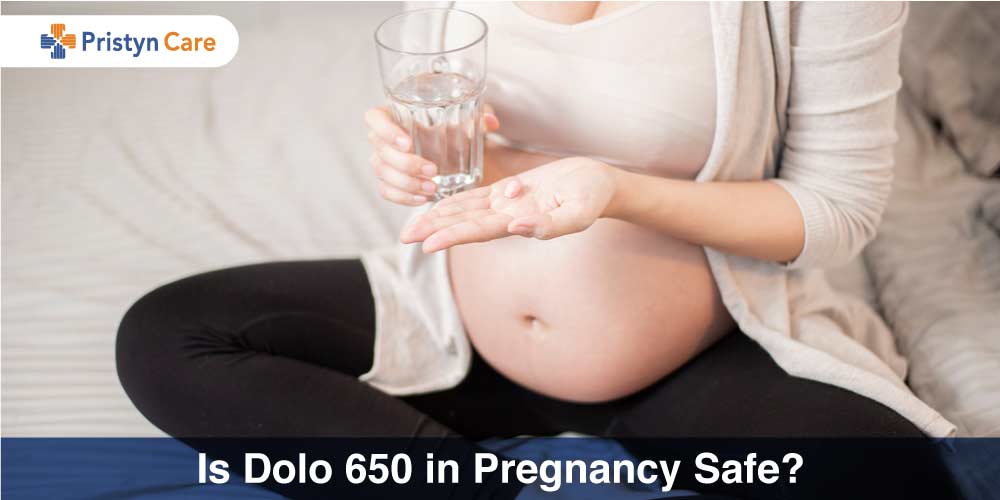 Pregnant Female holding Dolo 650 in her hand