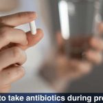 pregnant female holding antibioticn