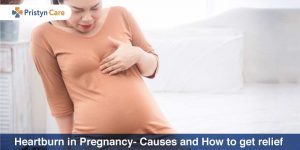 female having heartburn in pregnancy