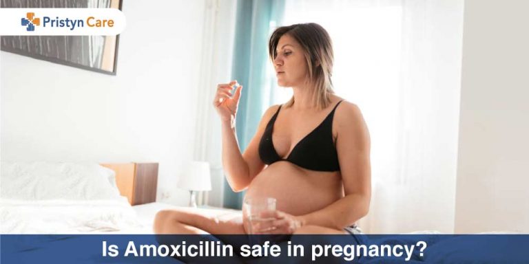 pregnant female holding Amoxicillin