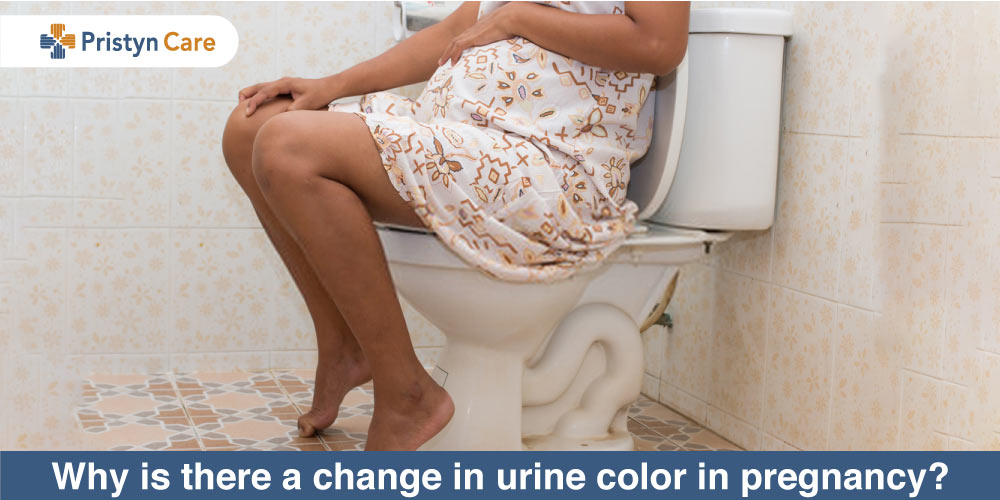 female sitting on toilet seat worried about change in urine coloraturas in pregnancy