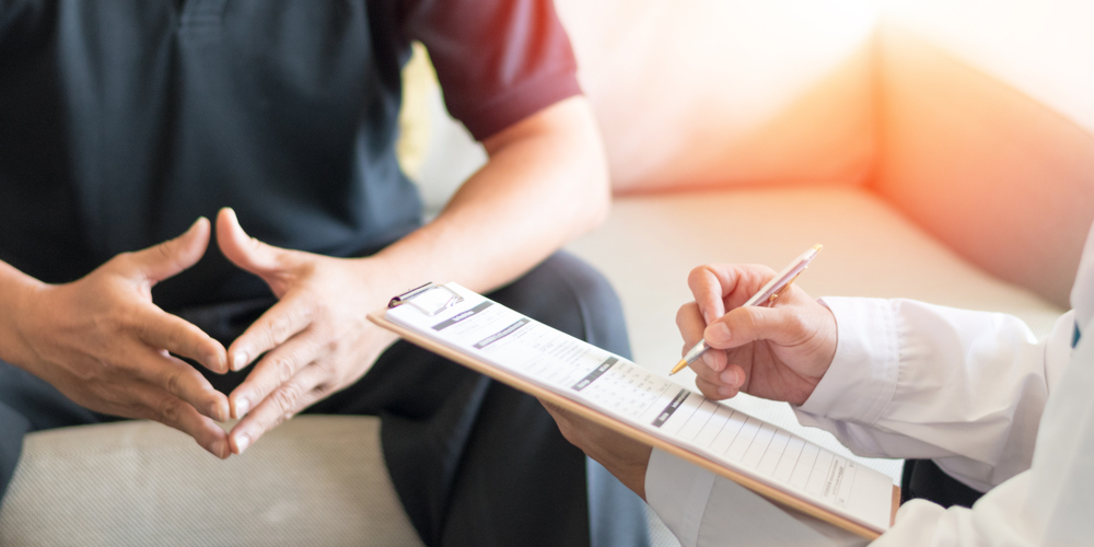 man at urologist for consultation for phimosis (tight foreskin)