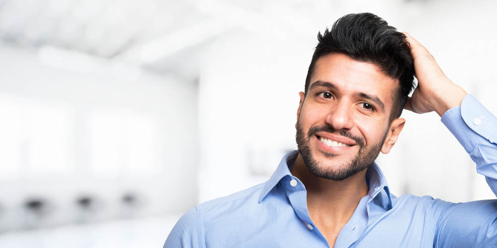 Man with natural looking hair after hair transplant