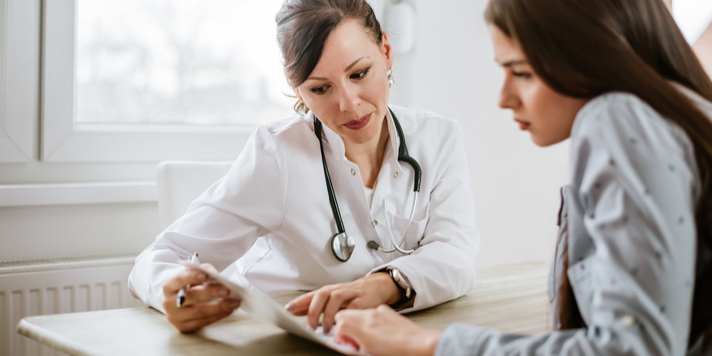 female at gynaecologist for prolapsed uterus treatment 