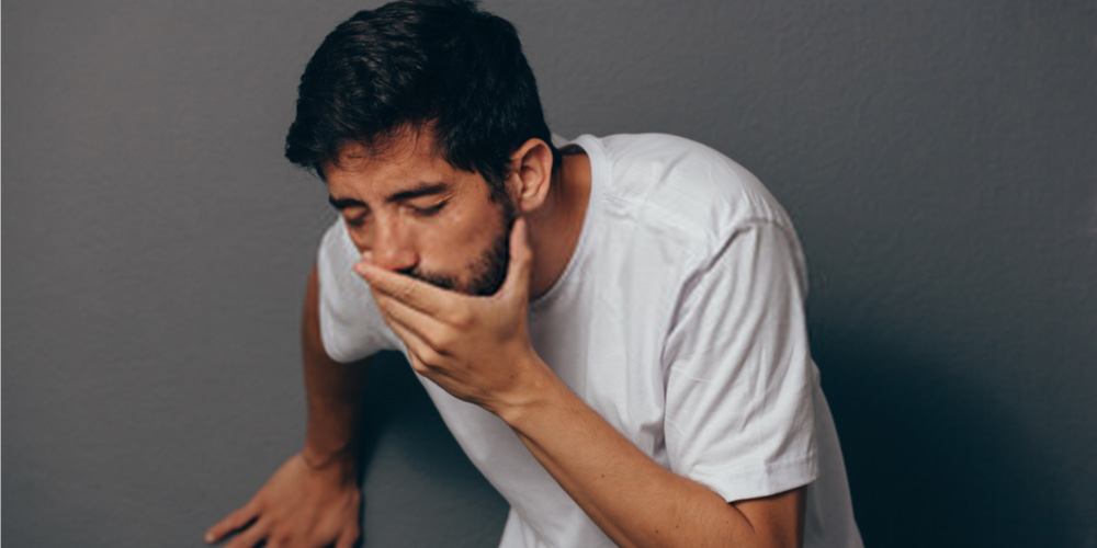 man feeling nausea-vomiting-side effects of hydrocele medicine